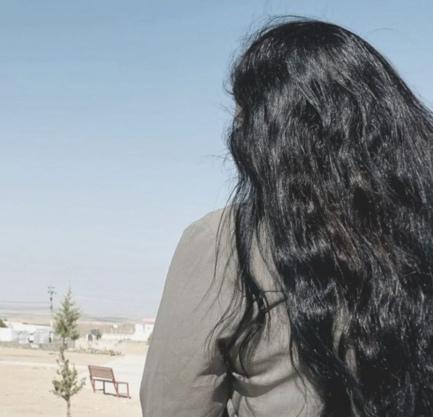 A woman holding her hair - Stock Photo [35620366] - PIXTA
