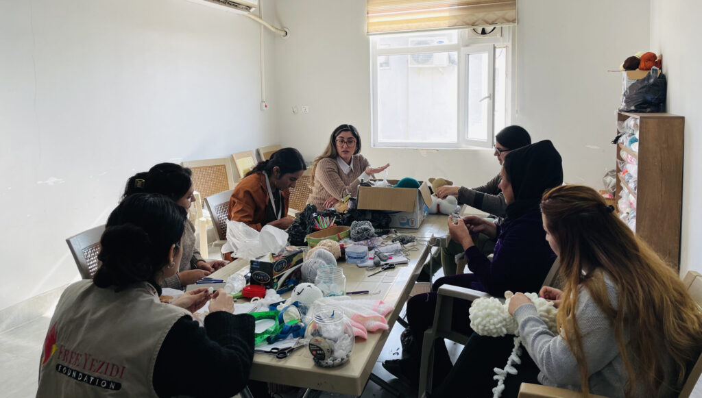 FYF Executive Director Pari Ibrahim, with the Yezidi women artisans at ETC